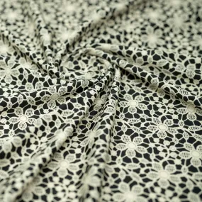 Ivory Flower Lace Pattern on Black Printed Spandex Fabric | Blue Moon Fabrics