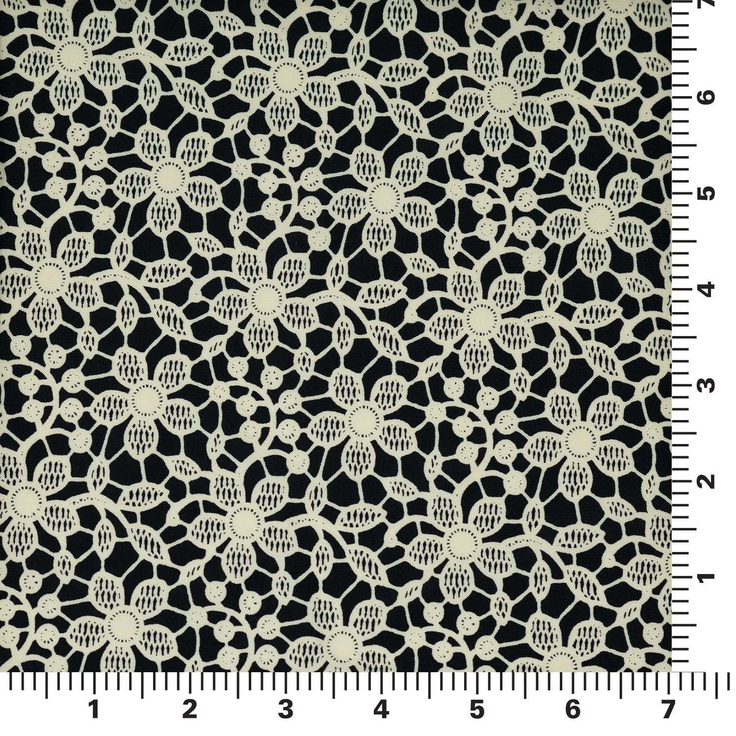 Ivory Flower Lace Pattern on Black Printed Spandex Fabric | Blue Moon Fabrics